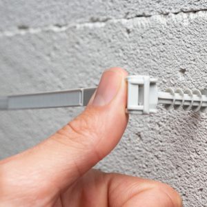 Wall plug FNTLOK01 is compatible with FNT1635 tie. Easy to assemble.