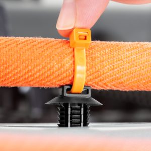 Fixing tie for hole (oval), inside serrated, ⌀5.0-50.0mm, orange/black, 3000pcs.